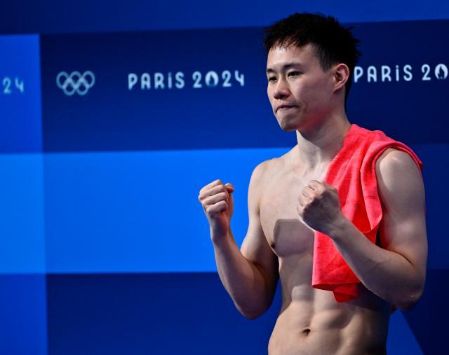 1723375824557027353.jpg 巴黎奥运会|跳水——男子3米板决赛:谢思埸、王宗源包揽金银牌XxjpseC011460_20240808_MVPFN0A001.jpg